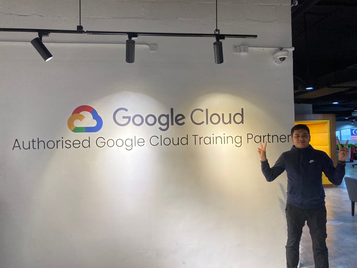 A.Syamil Ahmad at the Google Cloud Authorised Training Partner wall